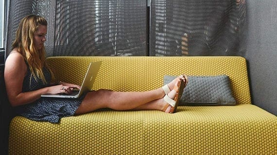 woman on computer A sedentary lifestyle is worse for you than smoking