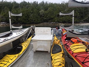 The kayak conveyance on an aluminum barge out to the Broken Group Islands in British Columbia from Toquaht Bay on the first day. Photo by Mike Robinson